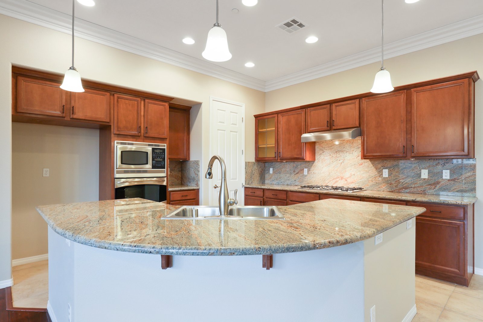 Empty kitchen before virtual staging